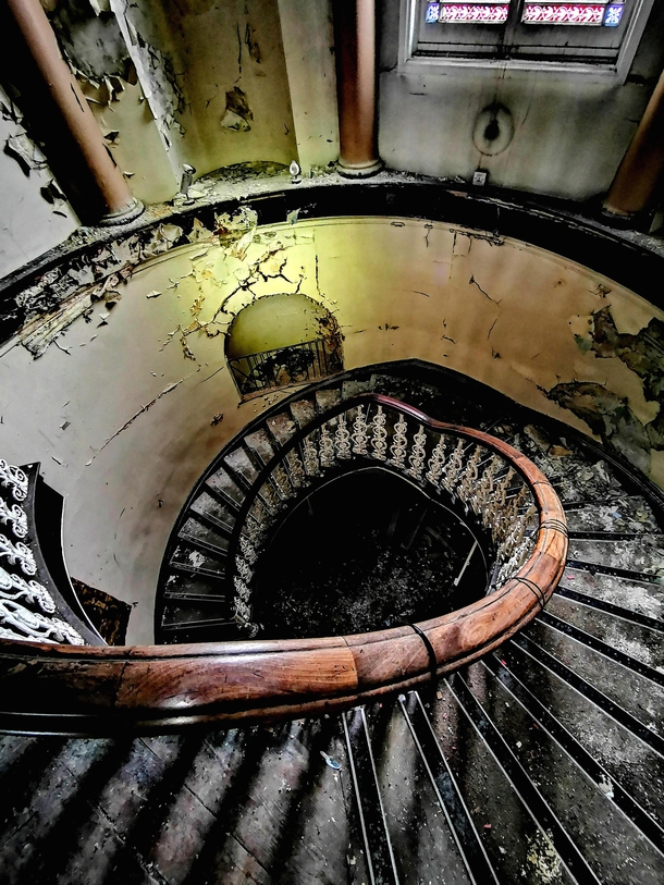  Creepy spiral staircase inside an abandoned school in Leeds England 