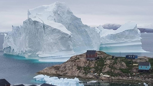  million ton iceberg towers over Greenland village