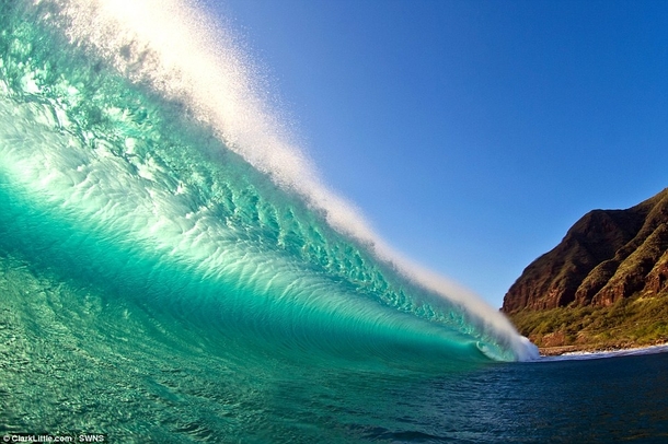 A back-lit wave on West Shore Oahu Hawaii 