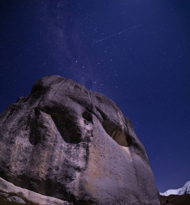 A big meteor strikes the sky over the limestone tors of Kura Tawhiti Canterbury New Zealand 