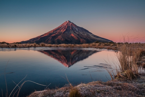 A cold morning by the foot of lonely Mount Taranaki New Zealand  by sam