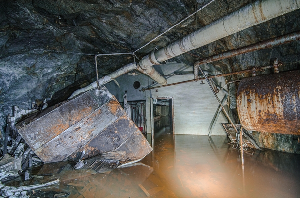 A flooded underground factory in Sweden It used to make large steel cables It was built underground to protect it from potential attacks 