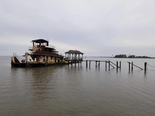 A friend of mine took this photo of a well weathered tug boat in Madisonville Louisiana We used to jump off the top when I was younger and dumber