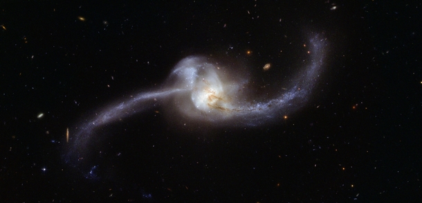 A glimpse into the future Arp NGC   located  million light-years away is in the later stages of a spiralspiral galactic collision Studying its properties have provided scientists with a better idea of the collision of the Milky Way and the Andromeda  imag