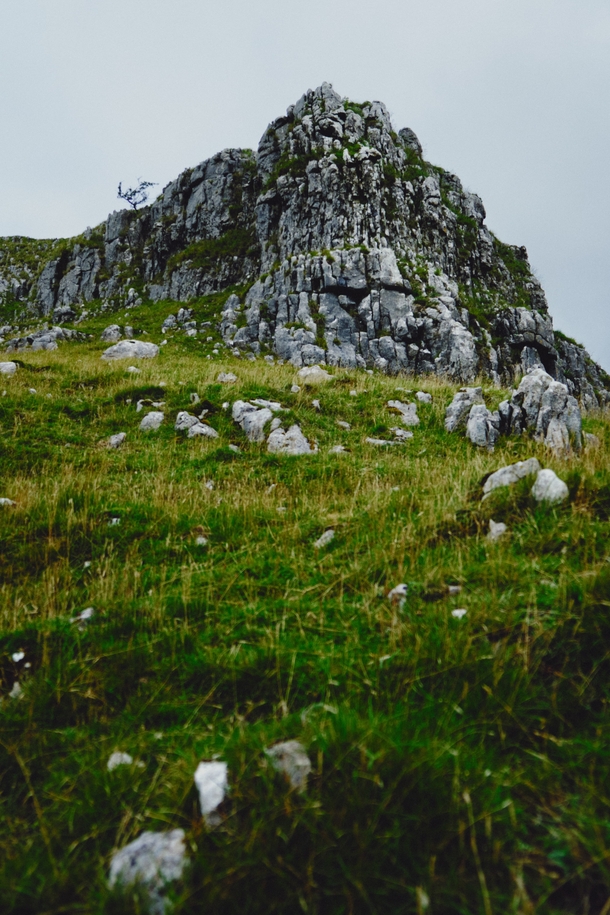 A limestone crag high above the Watlowes Dry Valley Malham Yorkshire Dales UK 