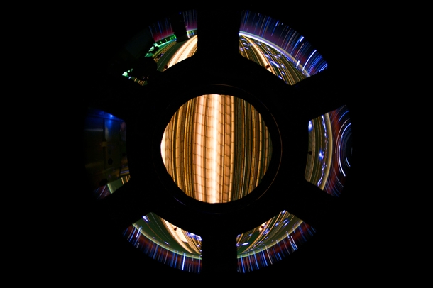 A long exposure of our planet as seen through the windows of the ISSs Cupola Module  by Don Pettit NASA astronaut