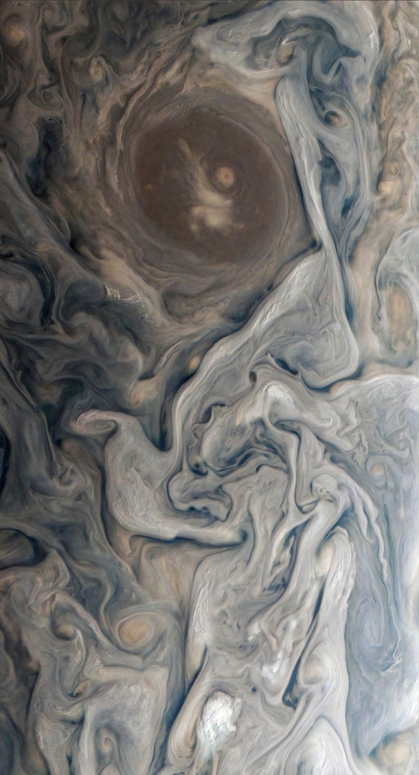 A lovely recolor of the swirling cloud tops of Jupiter taken by NASAs Juno probe