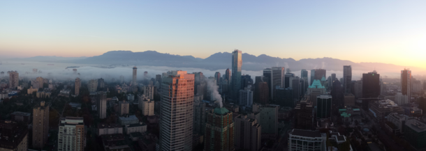 A picture I took this morning of fog rolling into downtown Vancouver BC 