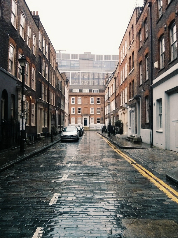 A rain-soaked street in east London  x