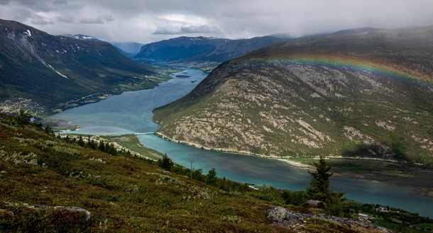 A river leading to the town of Lom in Jotunheimen Norway 