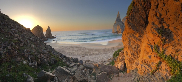 A secluded beach on the coast of Portugal named Praia da Ursa 