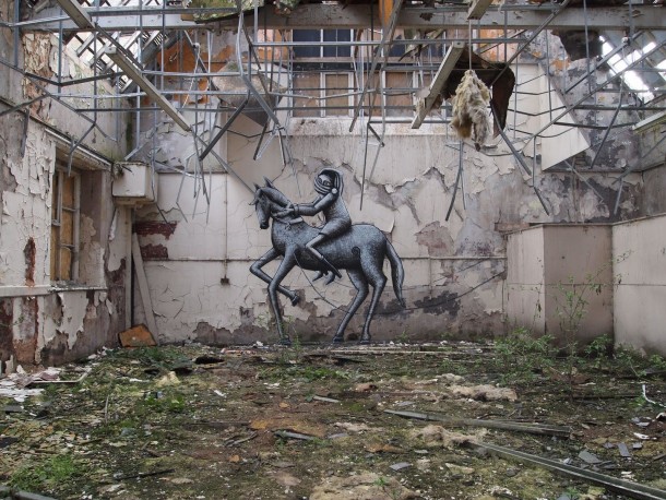 A seriously old and abandoned school with a bit of sprucing up by British street artist Phlegm 
