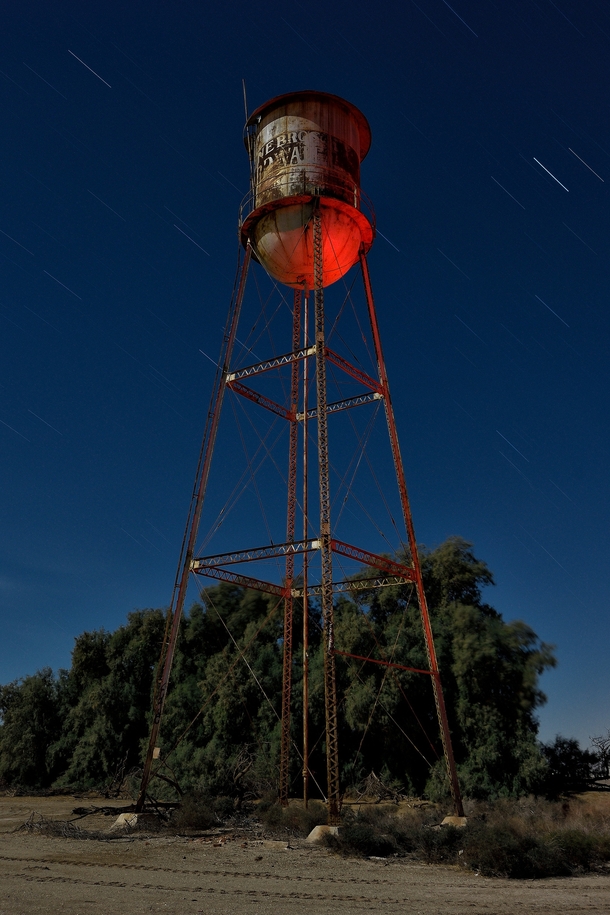 A water tower stands sentry over an abandoned farm in the vast agricultural area south of Californias Salton sea Photographed by Eyetwist 