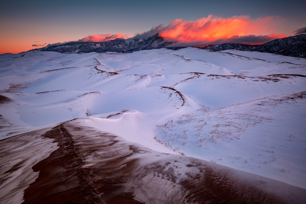 A winter sunrise from the backcountry of Great Sand Dunes National Park Colorado USA - 