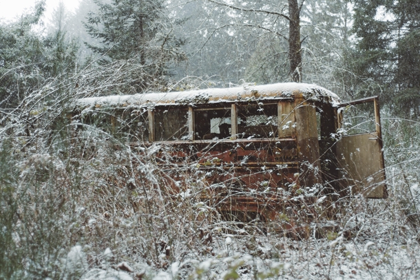 Abandoned bus in the snow