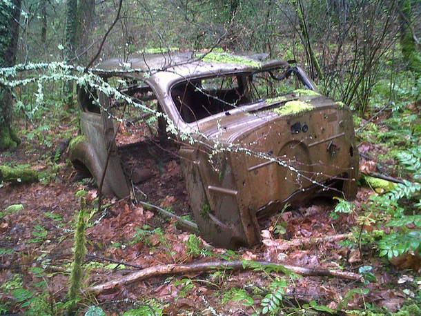 Abandoned car in forest near Mosier Tunnels Hood River Oregon 