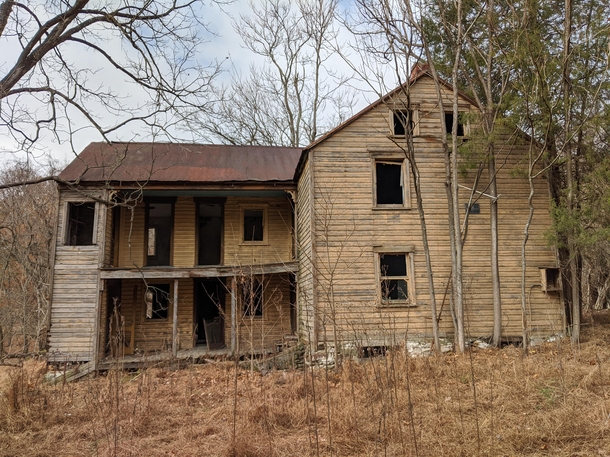 Abandoned farmhouse on national park property near Dargan Maryland and Harpers Ferry West Virginia Right side is original and framed with stacked hewn logs left side is a balloon-framed addition 