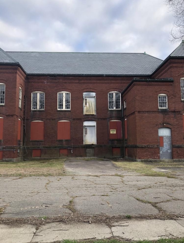 Abandoned Places Massachusetts - abandoned mental hospital in Medfield ive been to but if anyone else has been here lmk the way in because all ground level windows are covered with these red boards