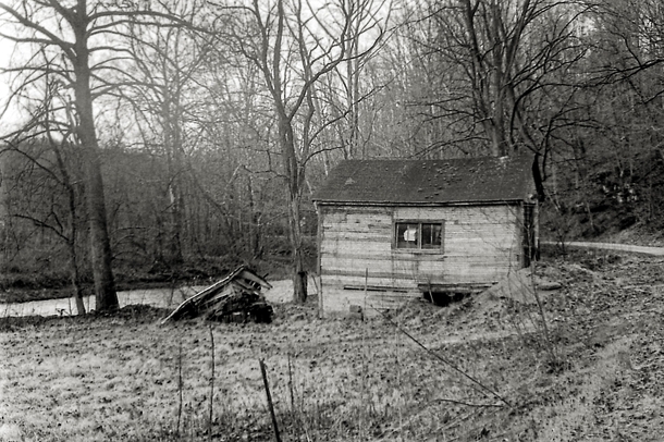 Abandoned shed along a dead end road