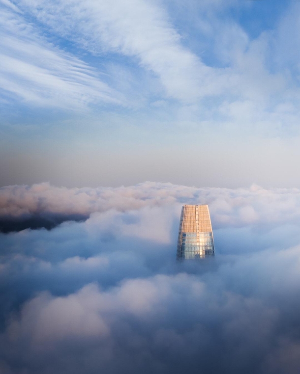 Above the fog Heres the salesforce tower from a helicopter
