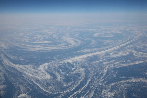Aerial view of eddies in the frigid Labrador Current taken from a trans-Atlantic flight 