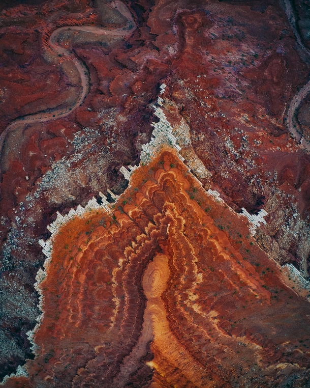 Aerial view showcases the geometry behind erosion outside of Canyonlands Utah  insta zachtesta