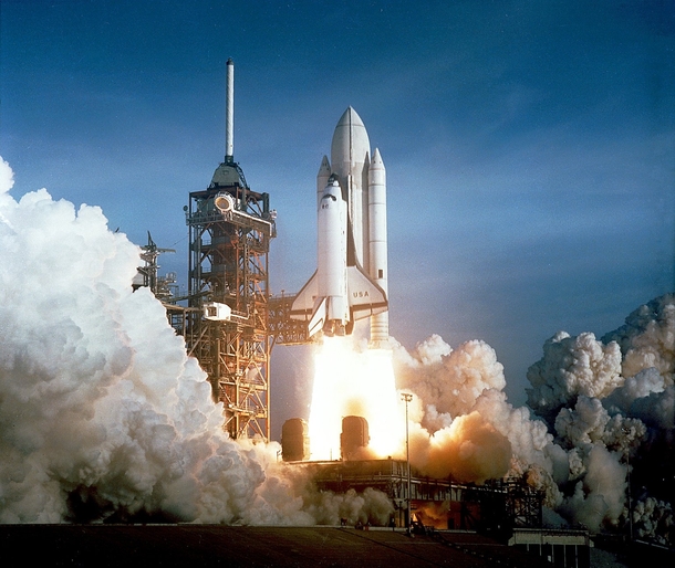 After  years of silence the thunder of human spaceflight was heard again as the successful launch of the first space shuttle ushered in a new concept in utilization of space Mission STS- on Space Shuttle Columbia launched from Kennedy Space Center on Apri