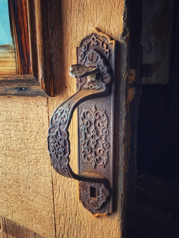 Amazing craftsmanship on this door handle found on a derelict farmhouse in Ontario Canada