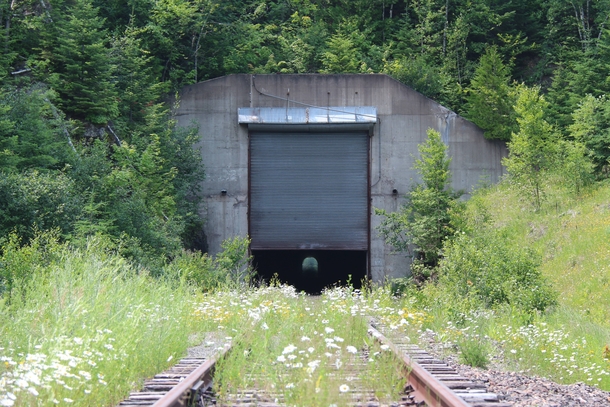 An abandoned railroad tunnel in Minnesota The retractable door was to prevent snow accumulation in the winter 