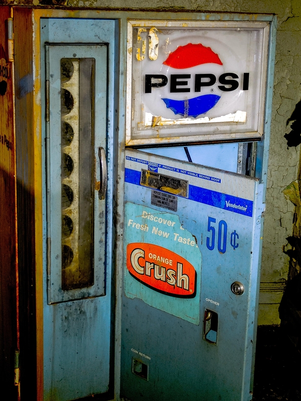 An amazing old Pepsi fridge sits in the basement of an abandoned church
