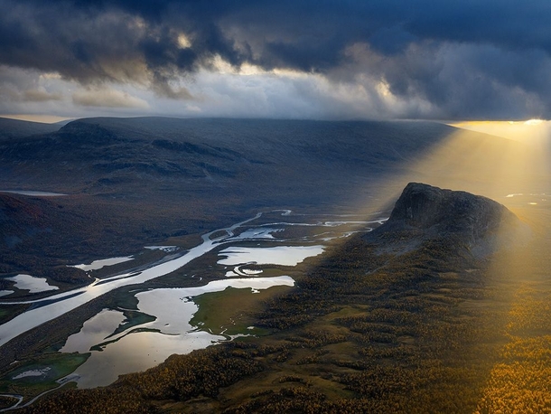 An autumn storm sweeps dramatically into the Rapa Valley in Swedens vast Laponia region spotlighting Mount Nammat Orsolya Haarberg 