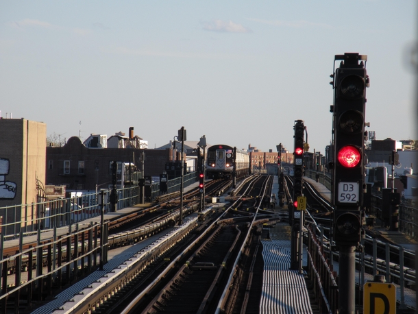 An N train approaches the switches near  St Brooklyn on the BMT West End Line 