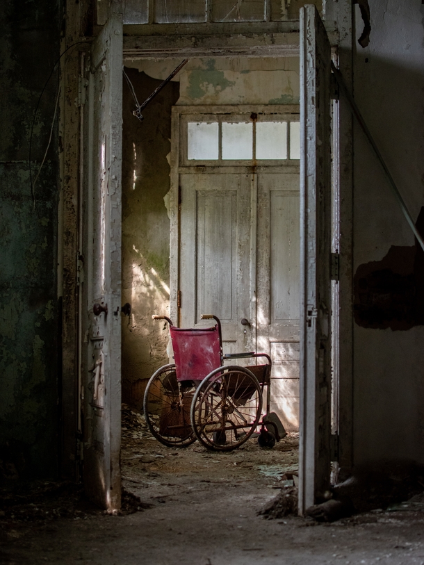 An old creepy wheelchair found inside a sanatorium