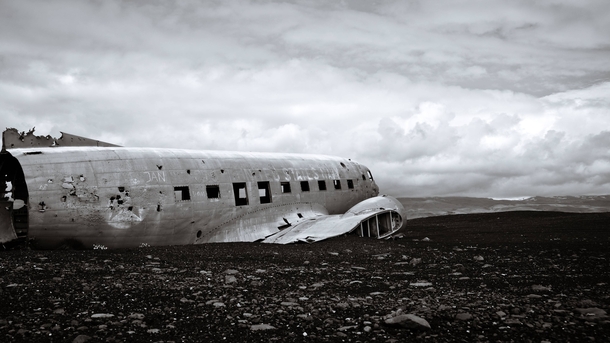An old DC- plane-wreck on the deserted black beaches of Slheimasandur in Iceland by stefanbecker 