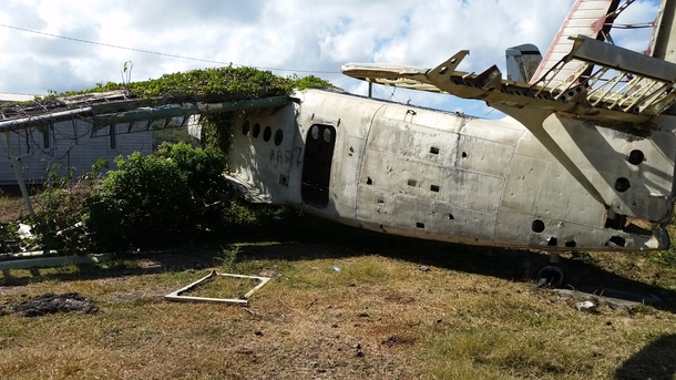 AN-R located in Grenada at the Pearls Airport  shot today One other shot of the cockpit with vines destroying everything