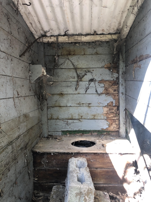 Anyone need the bathroom I dont know why I was so excited about seeing an outhouse its the first one Ive ever come across Toilet roll was still in the holder More info in comments 