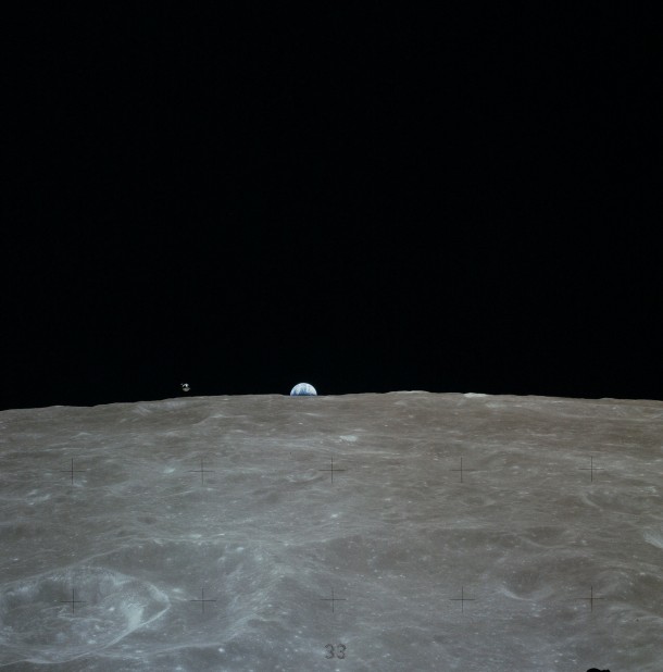 Apollo  CSM Casper in lunar orbit as Earth rises on the horizon 