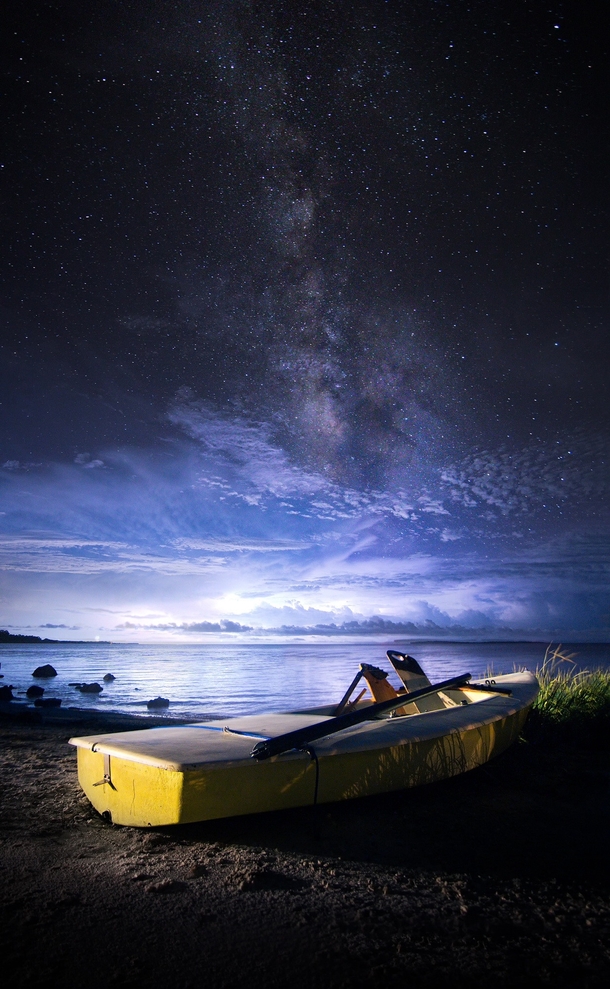Approaching storms under the Milky Way in Cedar Key FL 