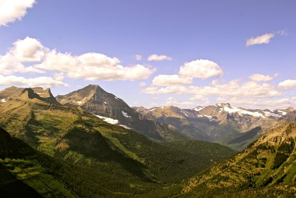At the tippy-top of the Dawson-Pitamakan trail in Glacier National Park Montana 