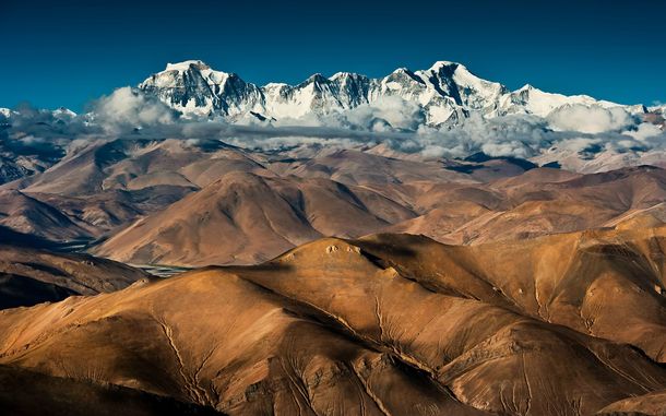 Barren Hills to Majestic Mountains Himalayan peaks in Tibet near Mount Cho Oyu 