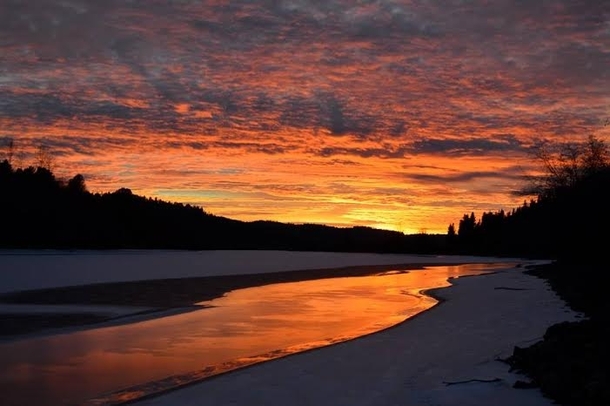 Beautiful sunset on the Coeur dAlene river in Harrison Idaho 