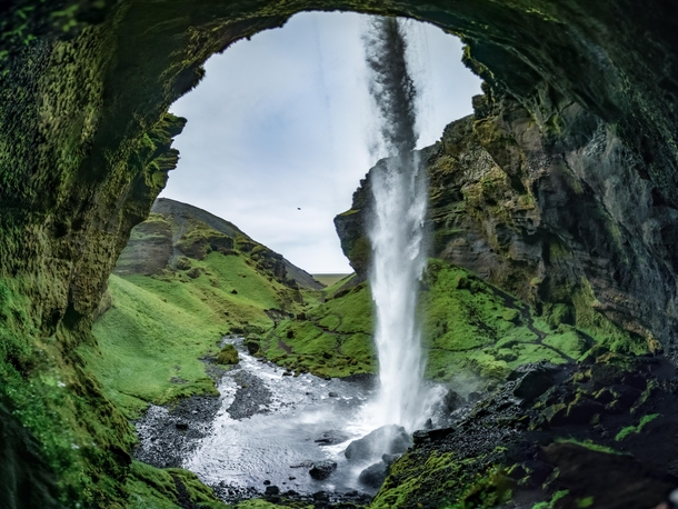 Behind a waterfall near Seljalandsfoss in Iceland 