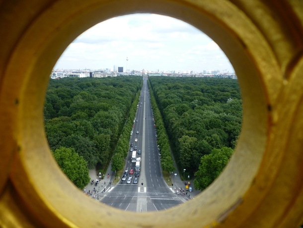Berlin Germany through a golden hole in the Victory Column 