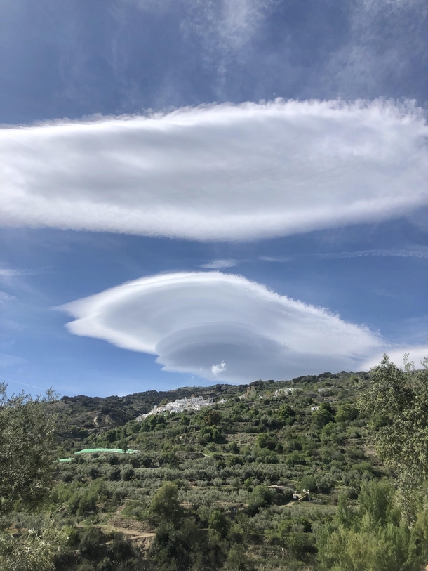 Big stationary clouds forming all day over peak of mountain in Southern Spain Sierra Nevadas  OC