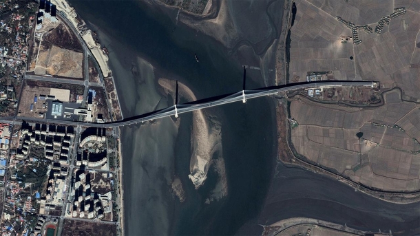 Bridge to Nowhere - spanning from Dandong China into North Korean fields 