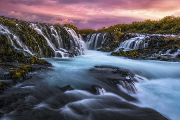 Bruarfoss my favorite waterfall in Iceland Definitely one of the more vibrant sunrises Ive experienced it took three hikes before the right conditions presented themselves In this location the best compositions usually require careful rock balancing acrob