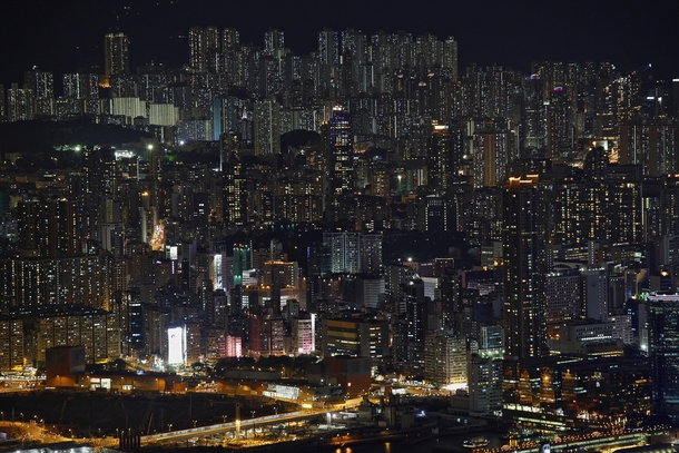 Buildings on a hillside in Hong Kong Bobby Yip 