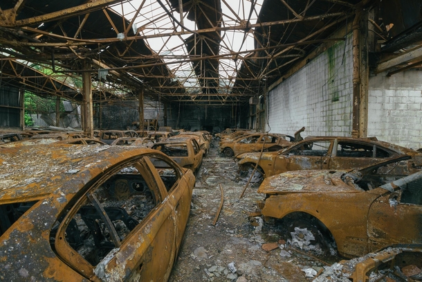 BURNOUT - Hundreds of burnt out cars line this dealership which was destroyed in an arson attack 