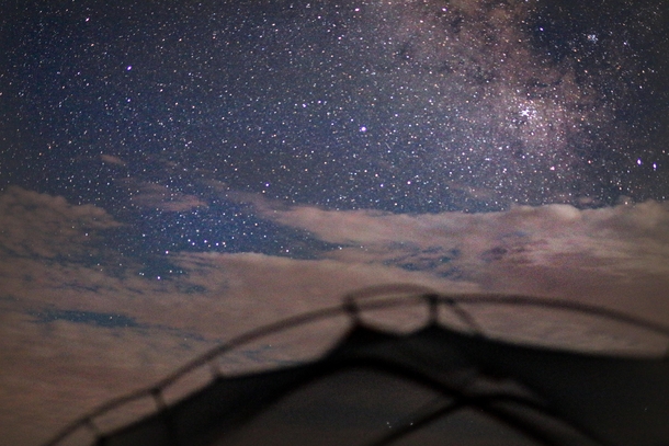 Cant wait for camping season to start again This was southern Utah aka earth Mars it was overcast all day then right before I settled into my tent for the night the wind picked up and I got some good stars between the clouds
