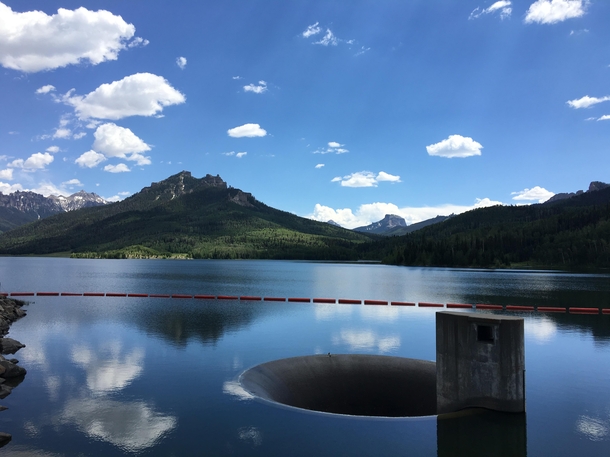 Cistern over glassy lake Silverjack Lake Colorado 
